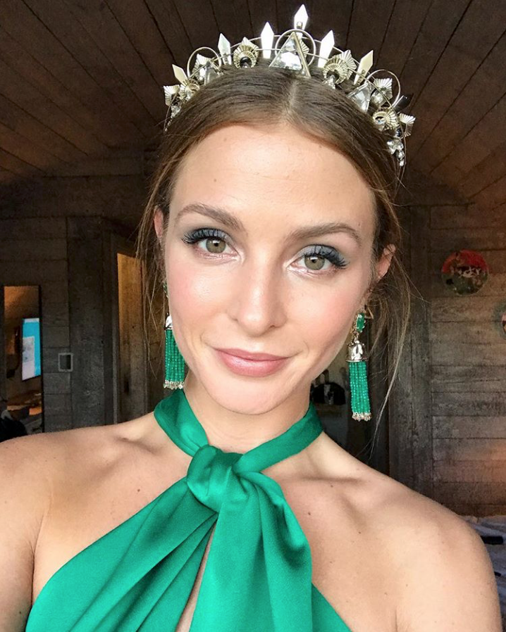 Millie Mackintosh wears a crown by Tilly Thomas Lux and an Emerald dress by Halfpenny London