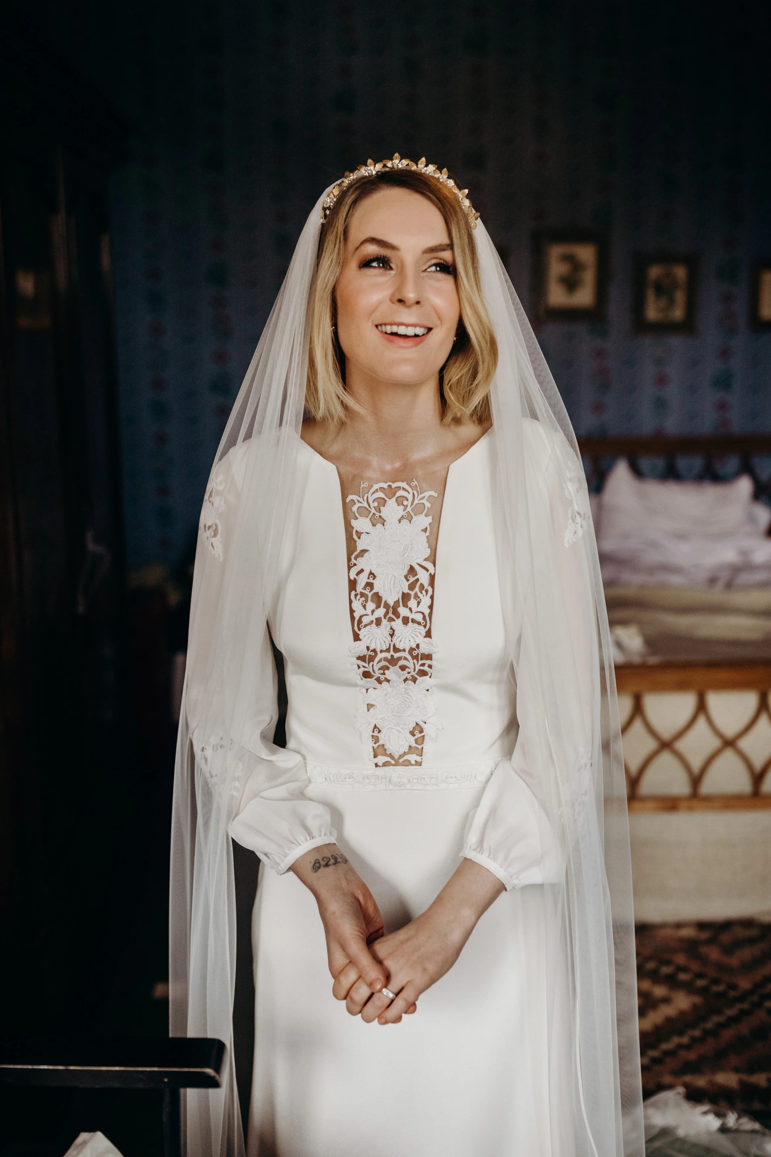 Bespoke Leafy Tilly Thomas Lux crown and a Wedding dress with Sleeves and Lace for a gorgeous bride