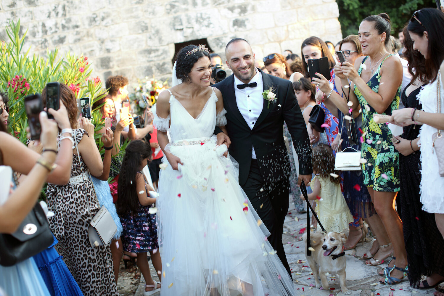 A bespoke butterfly Tilly Thomas Lux crown for a bride wearing a gown she designed herself