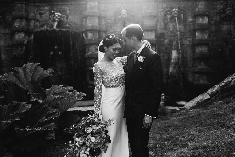 A stunning Rime Arodaky wedding gown and bespoke TTL headpiece for an English Country Wedding | Image by&nbsp;David Jenkins Photography