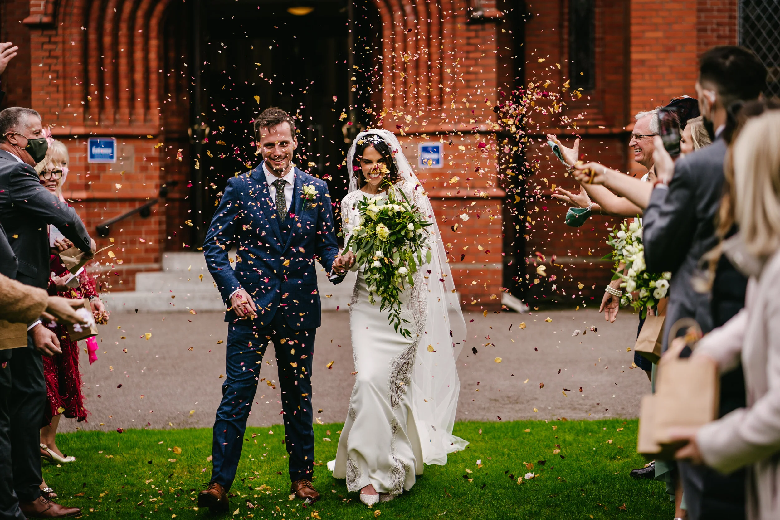 A Tilly Thomas Lux Calypso headpiece and long-sleeved gown for an intimate wedding