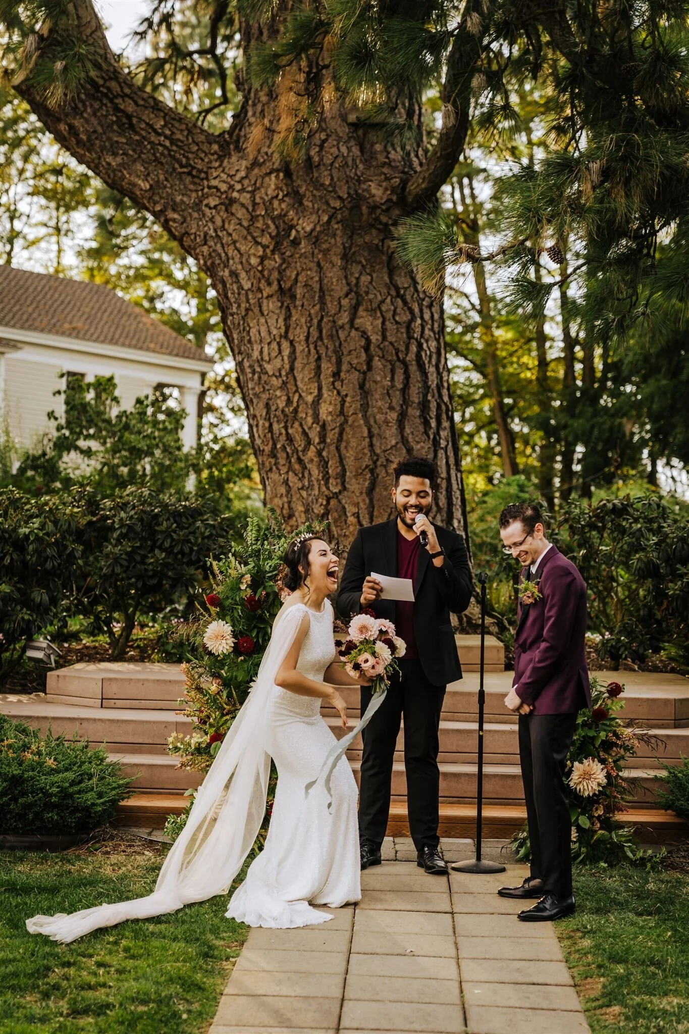 Stunning backless wedding dress and Tilly Thomas Lux Old Hollywood crown
