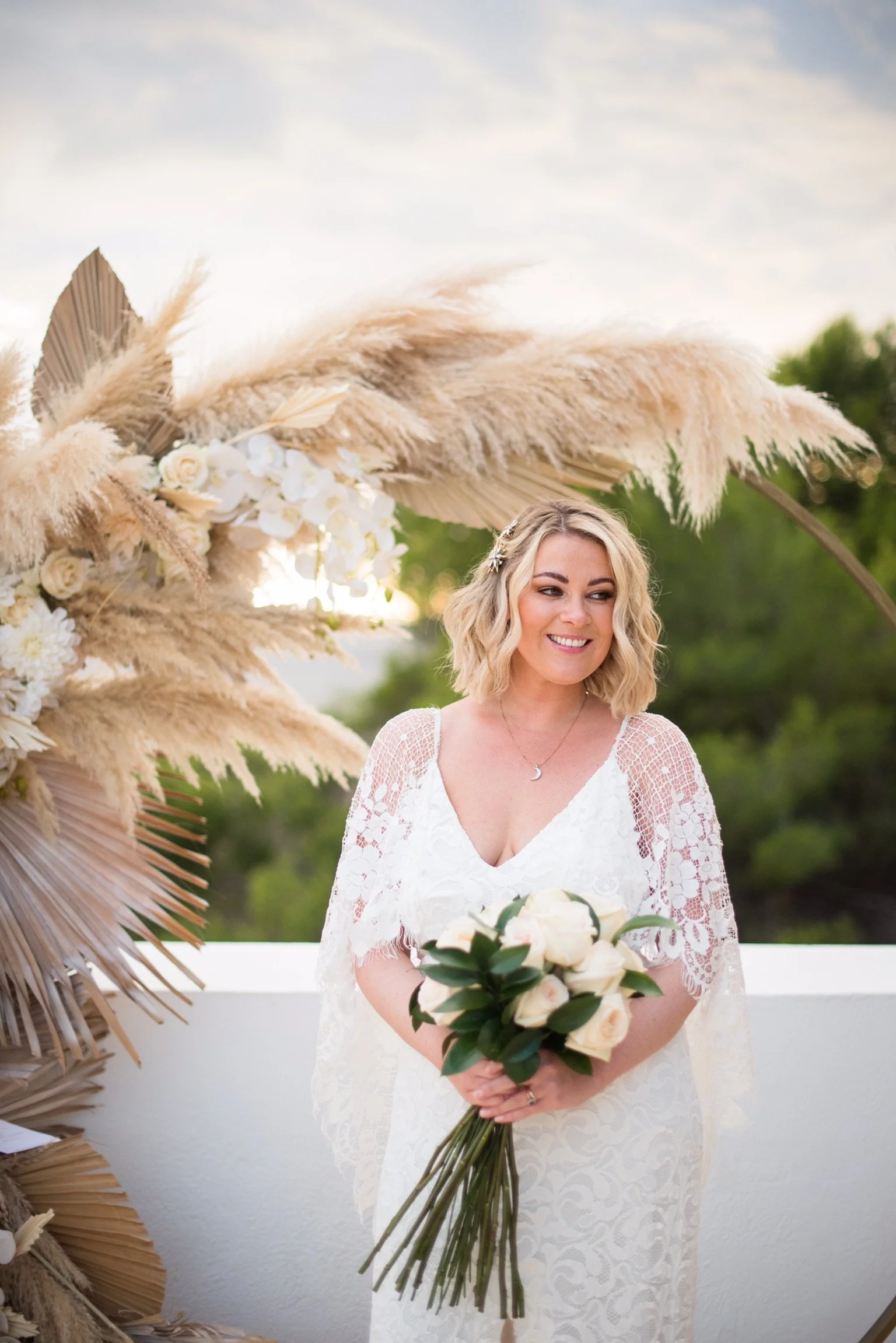 Tilly Thomas Lux Celestial hairpins and a Grace Loves Lace gown for an Ibiza wedding