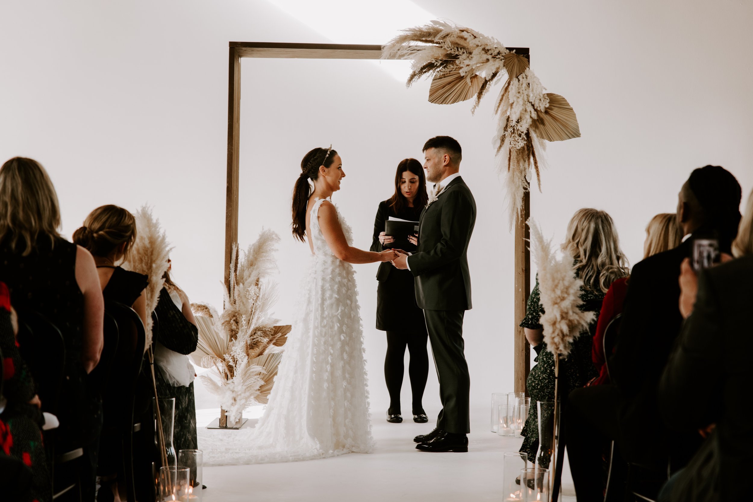 A Tilly Thomas Lux Crown and textured wedding dress for a cool wedding at Loft Studios