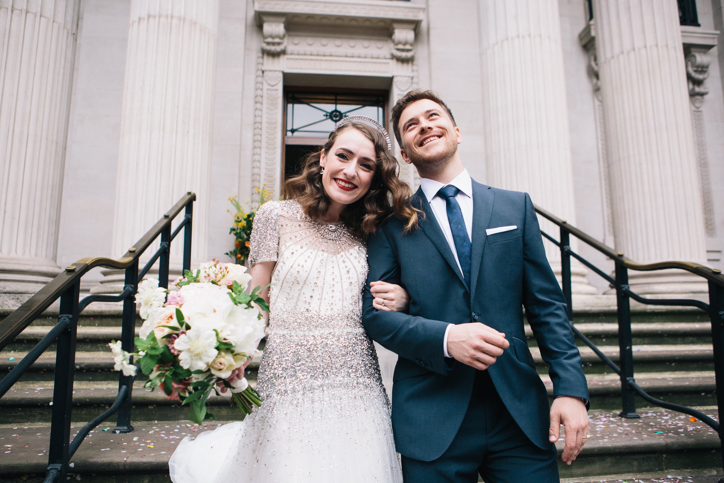 An embellished Jenny Packham gown and a Tilly Thomas Lux crown for a glamorous wedding
