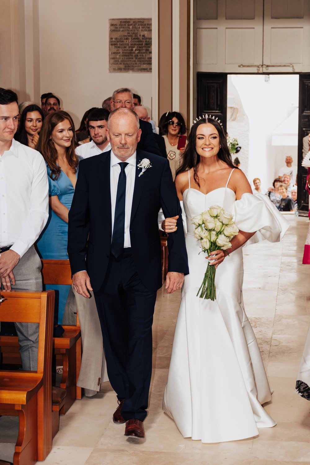 A beautiful wedding in Puglia with a bride wearing a Tilly Thomas Lux crown