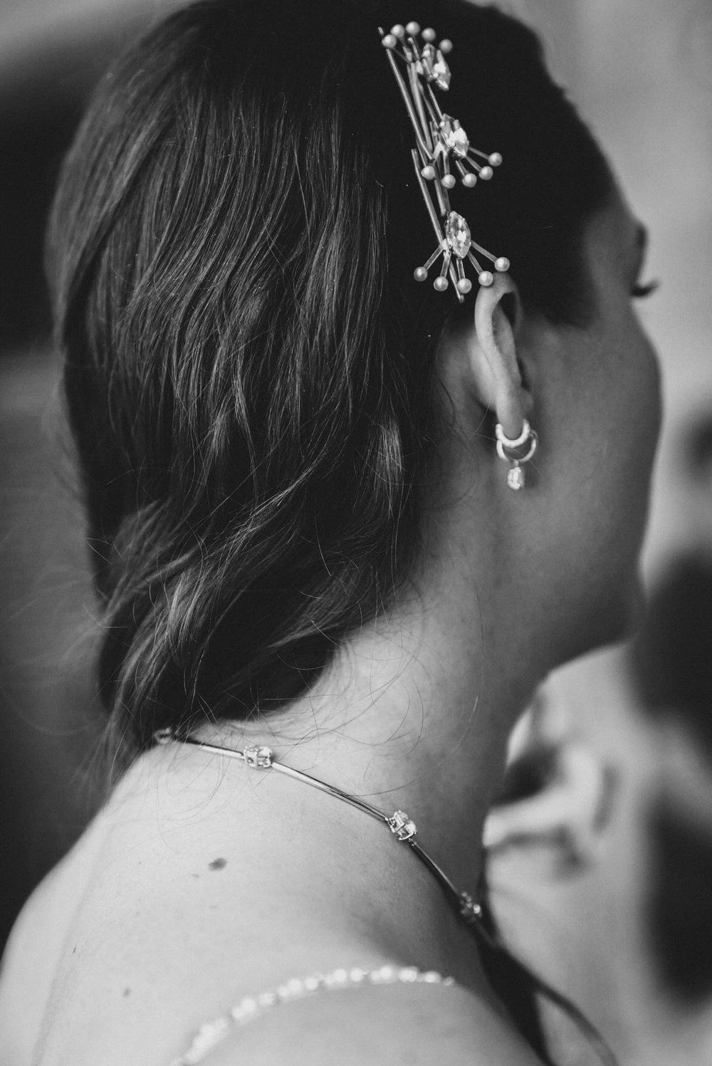 A gorgeous beaded wedding dress and Tilly Thomas Lux hair pins for a lovely wedding