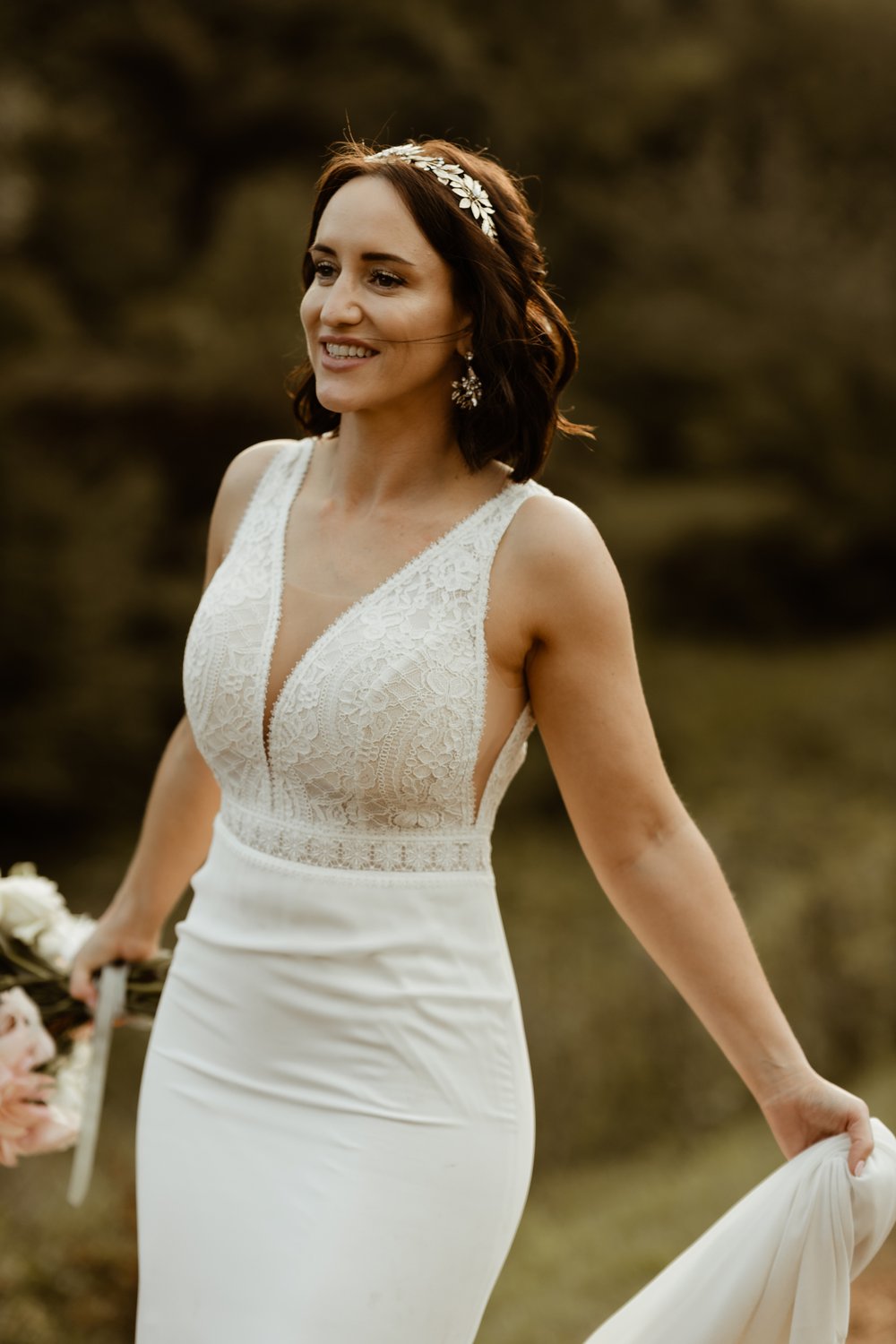 A Tilly Thomas Lux Ivy crown and matching leafy earrings for a stunning outdoor wedding