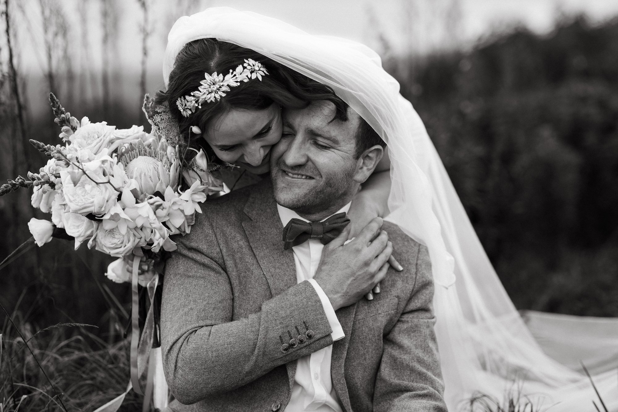 A Tilly Thomas Lux Ivy crown and matching leafy earrings for a stunning outdoor wedding