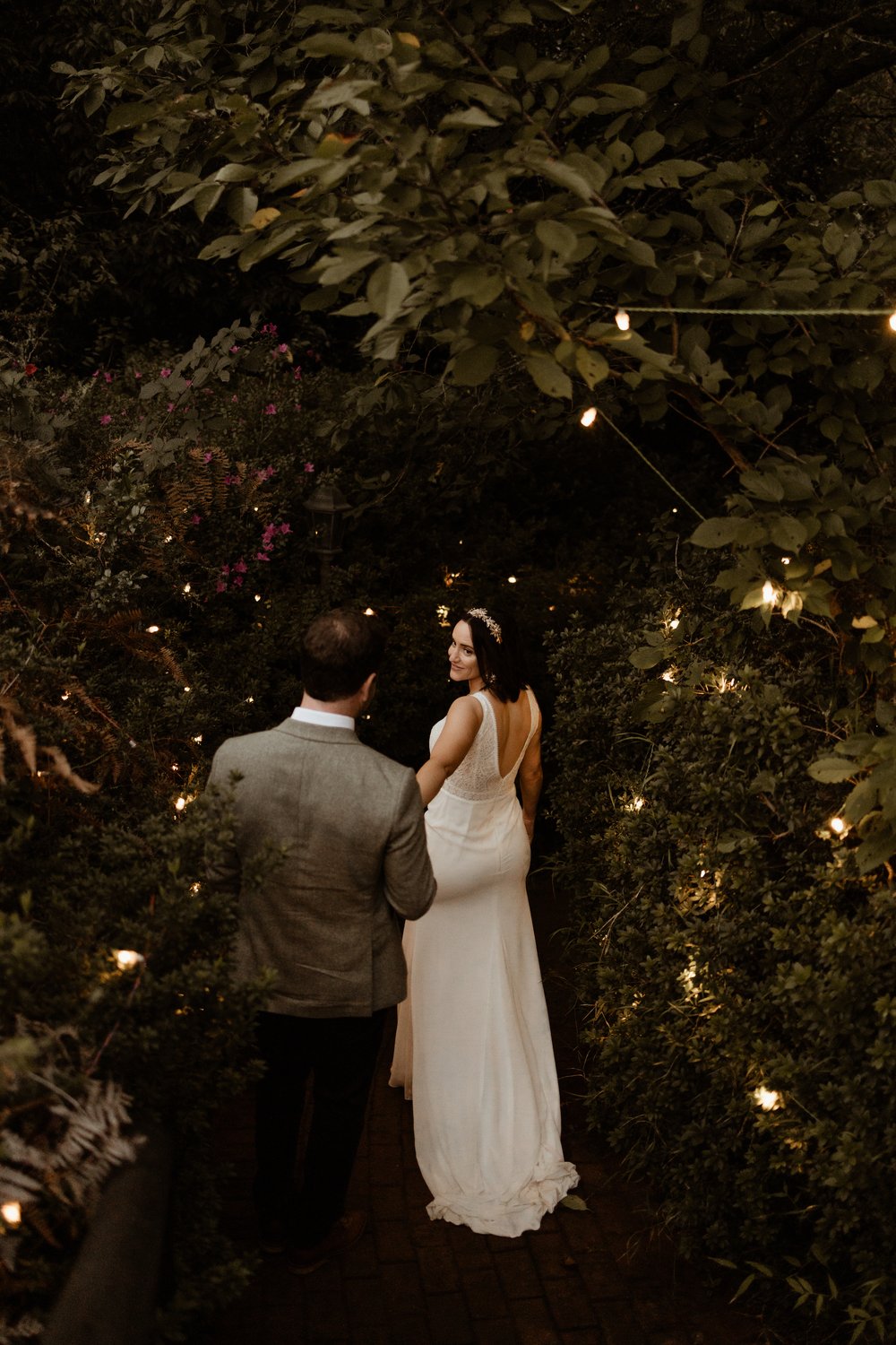 A Tilly Thomas Lux Ivy crown and matching leafy earrings for a stunning outdoor wedding