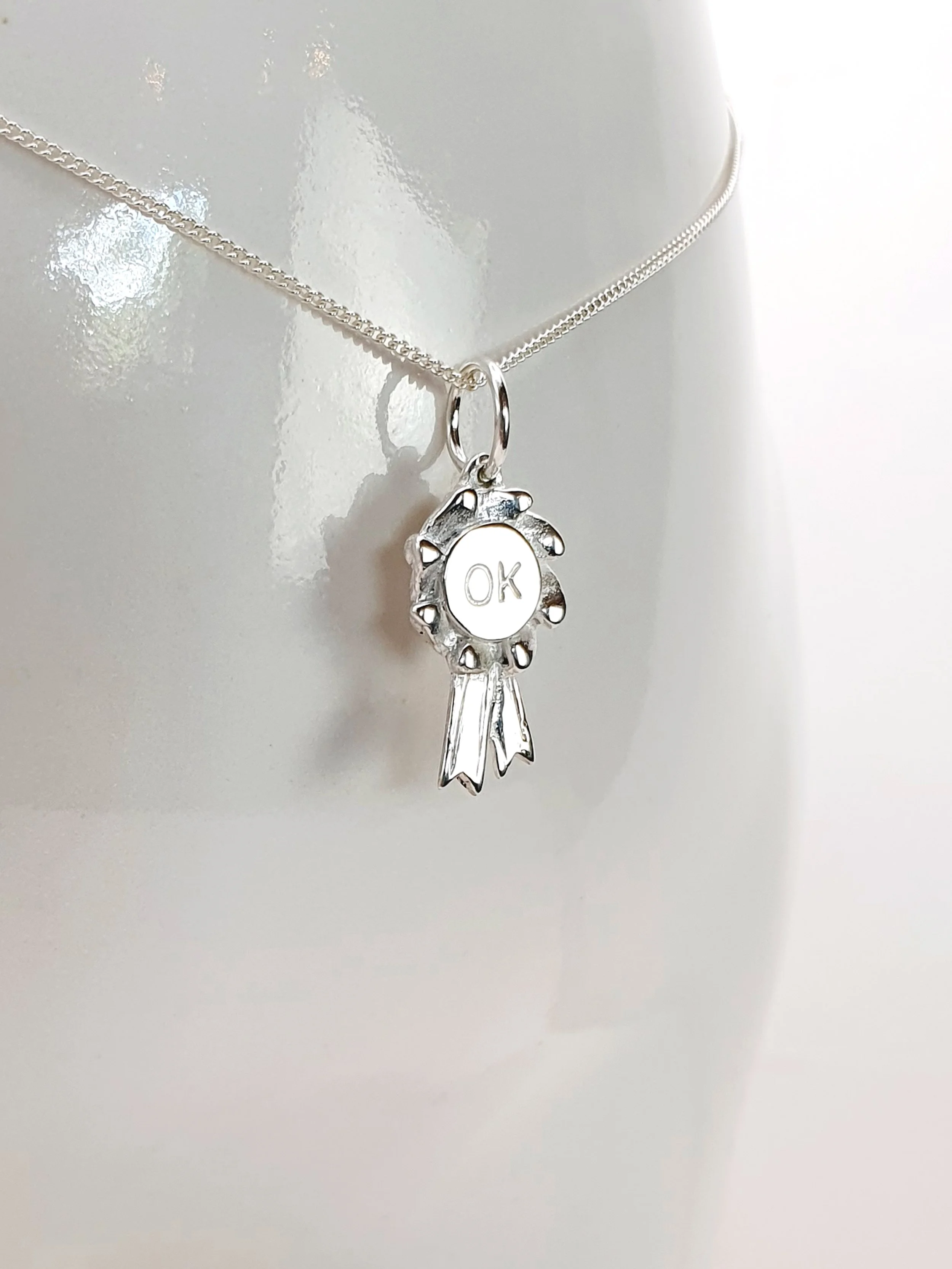 Rosette pendant - OK