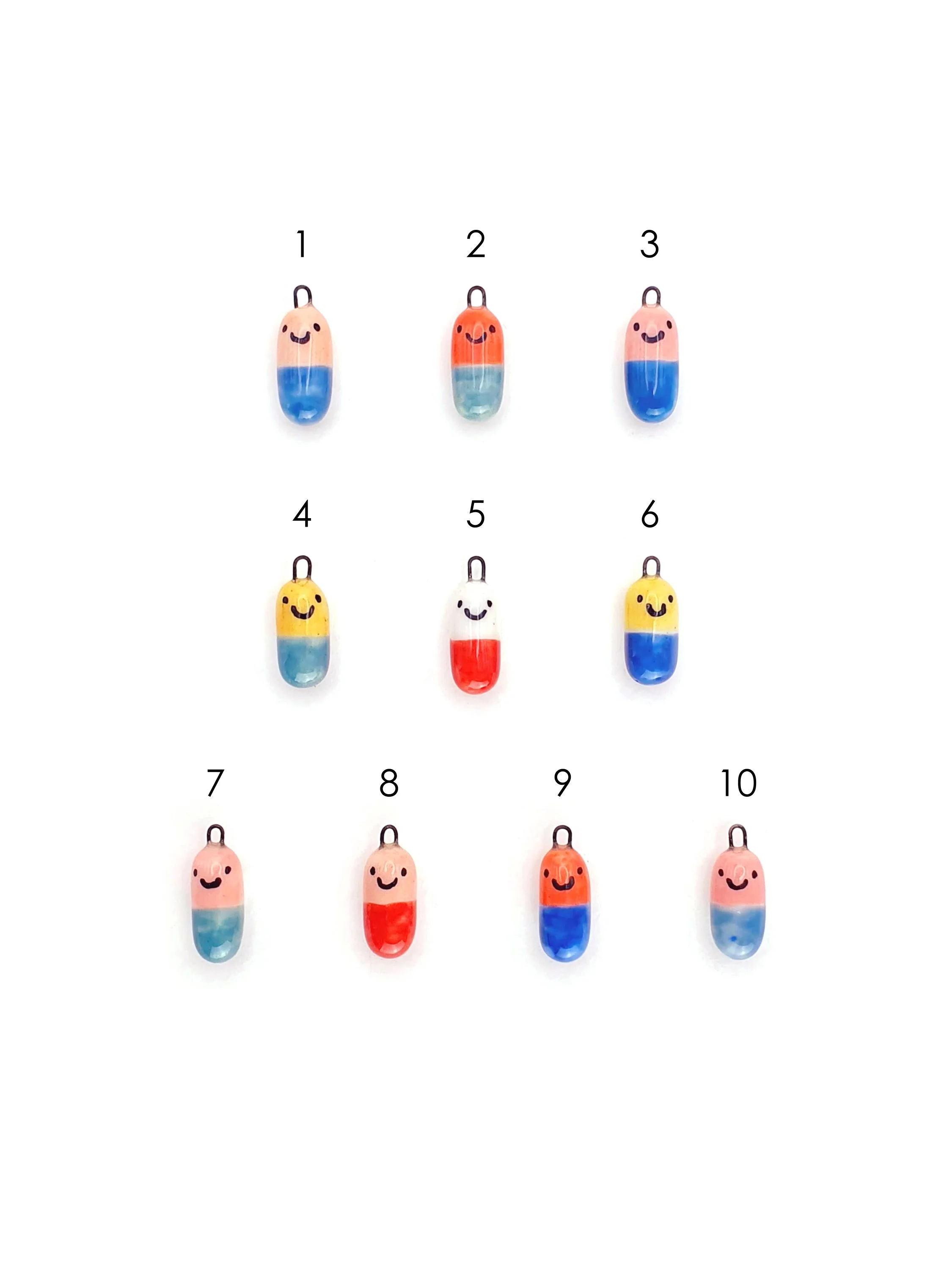 SECONDS Happy Pills - coloured capsules with faces