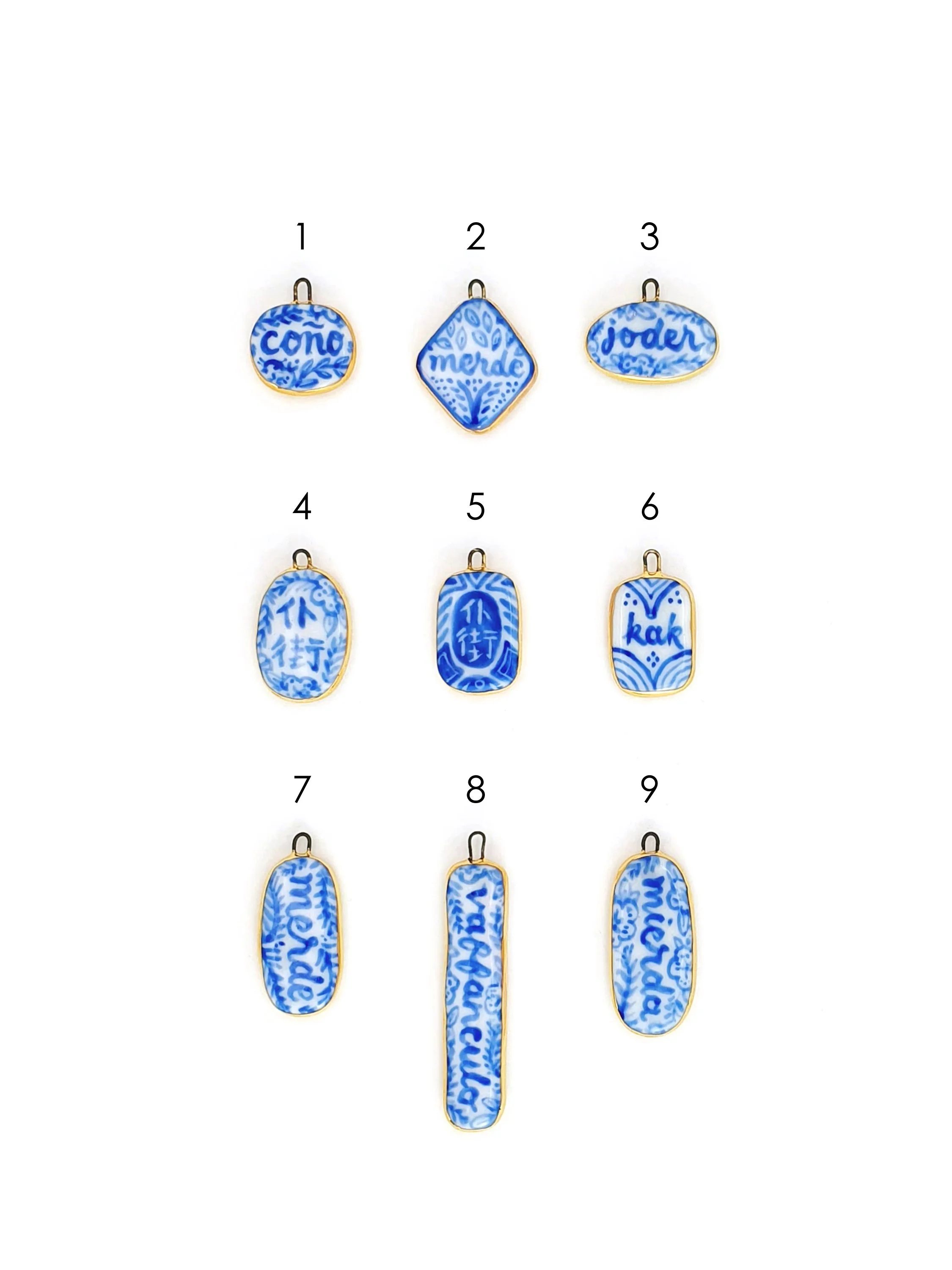 Blue and white non-English sweary lozenge charms