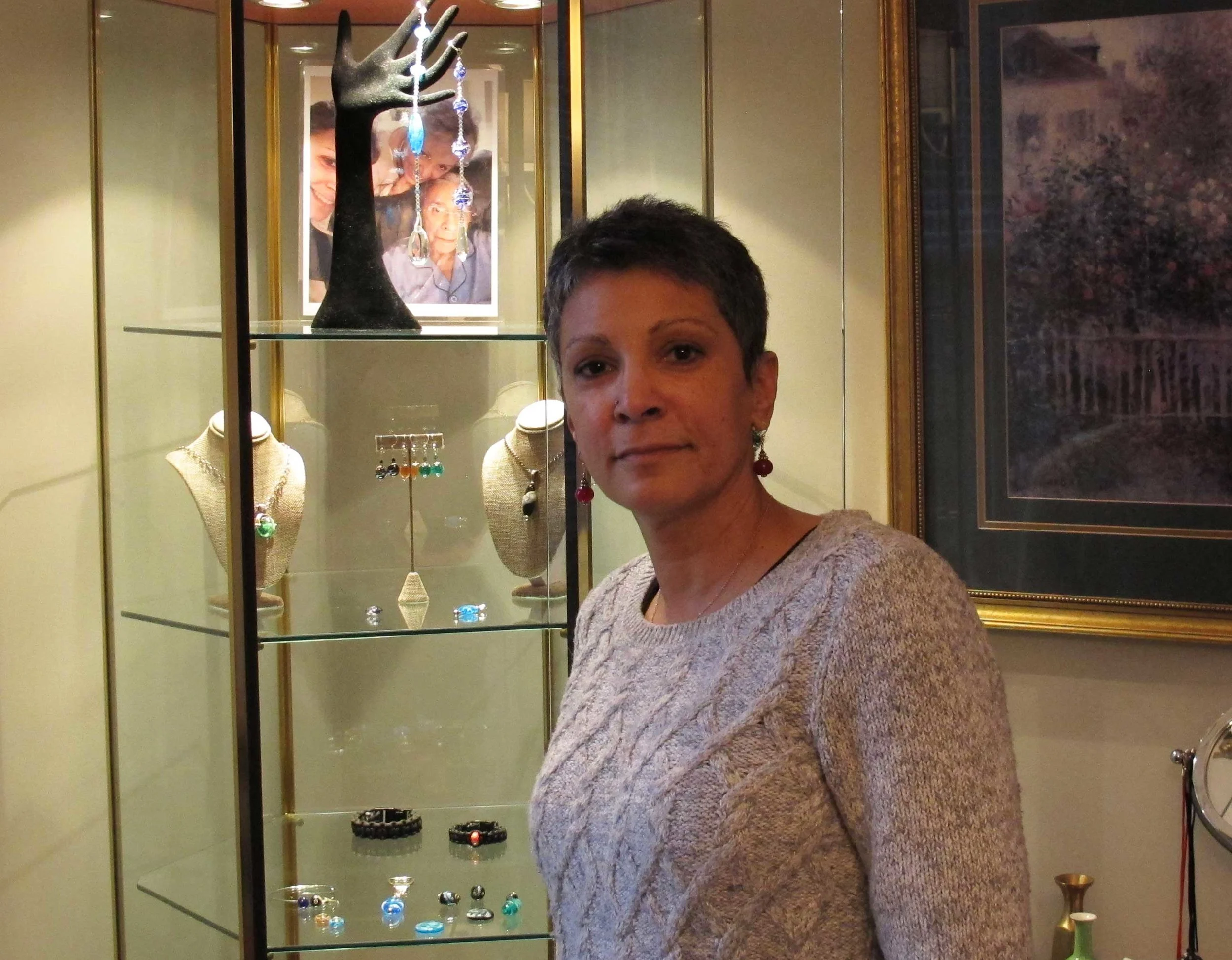  Vangie with some of her unique designs. 