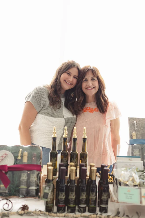 Women laughing at a FemCity networking event