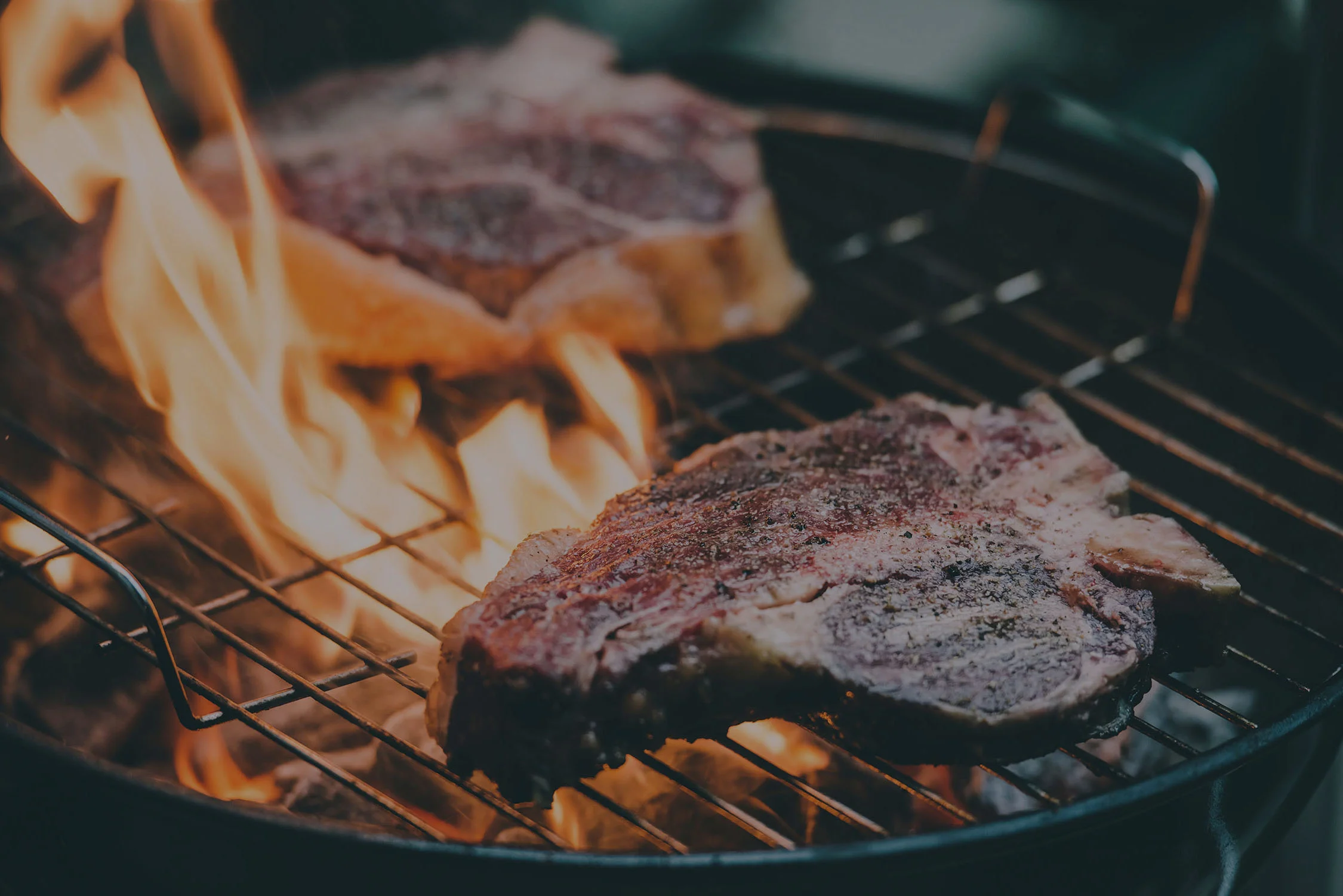 wood smoke pellets cooking barbecue steak.jpg