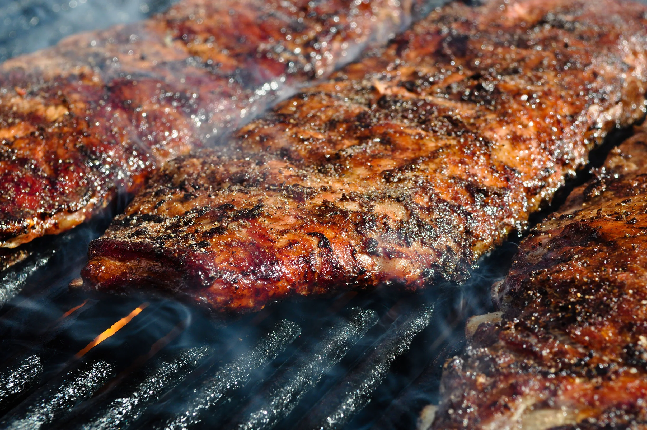 wood smoke pellets cooking barbecue ribs.jpg