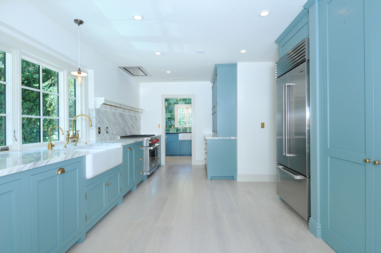 white-turquoise-kitchen-brass-fixtures-waterford-construction.jpg
