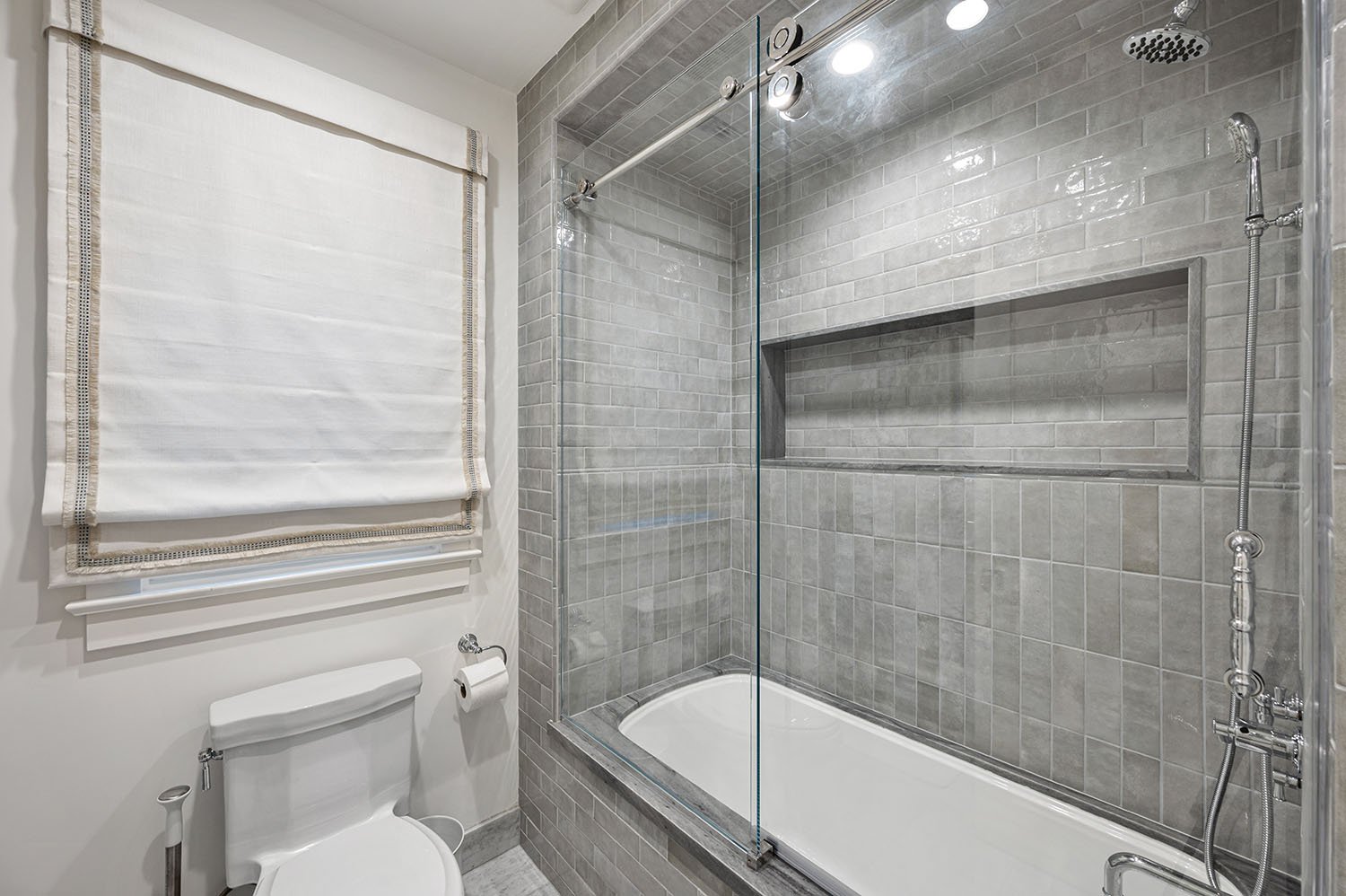 tub-shower-gray-tile-waterford-construction.jpg