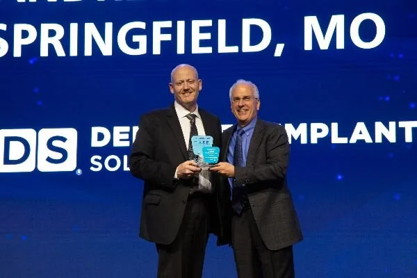 Innovation Award Dr. Andrew Schneider,