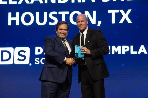 Top Growth Award Dr. Greg Richards and Dr. Alexandra Shepherd