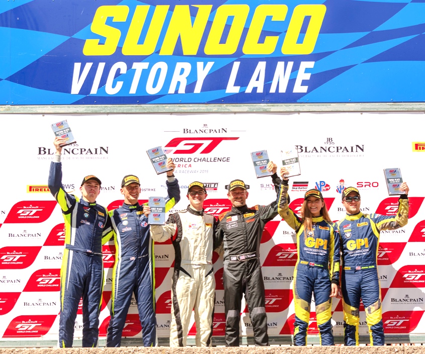 Photo: Sean Krinik - All 4 ST Racing drivers on podium. Left - 2nd Place ( Jon Miller / Harry Gottsacker ) Right - 3rd Place ( Samantha Tan / Jason Wolfe )
