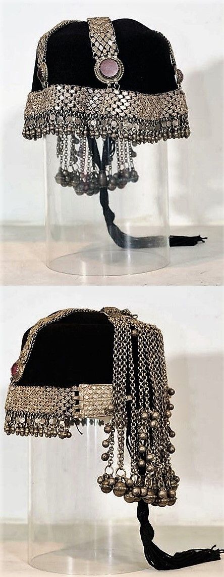 “Tribal female headdress in traditional Yemeni style, ca. 1920s. Silver with carnelian stone insets and black fabric.”