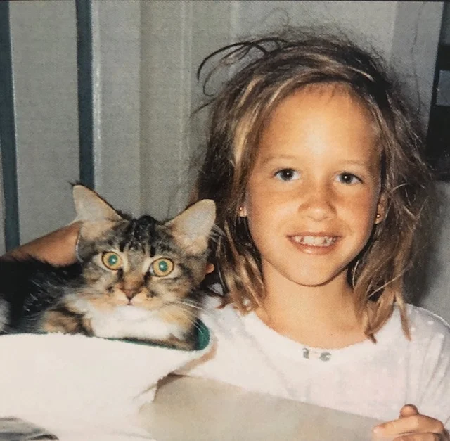 I now have a different cat, straighter teeth, and longer hair, but little else has changed.