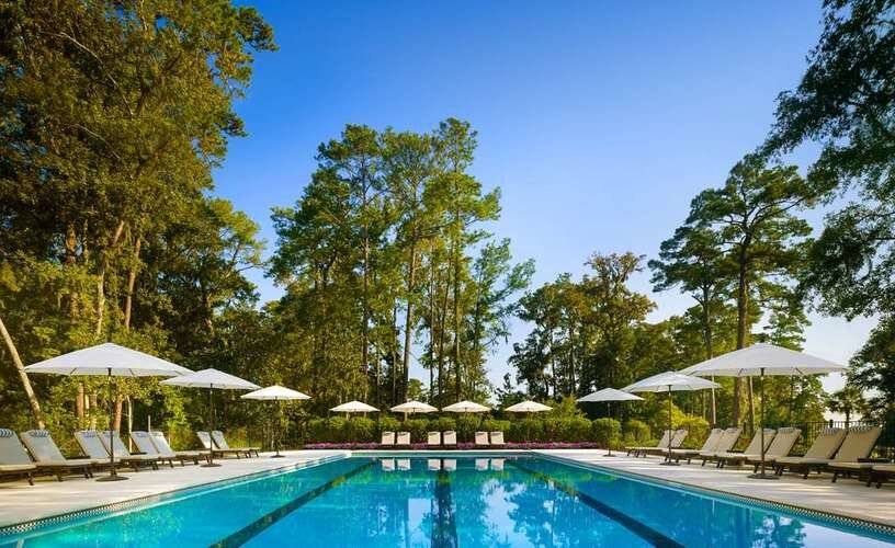 Relax by the pool at Montage Palmetto Bluff