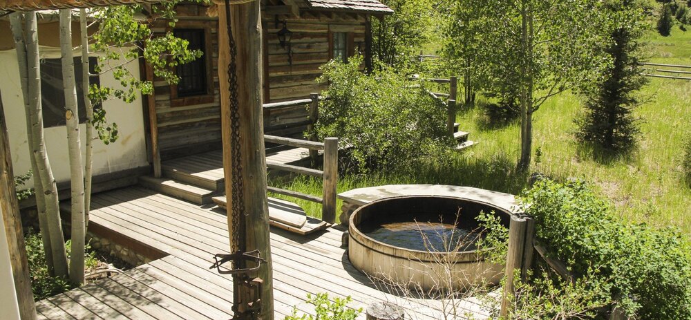 Trapper canvas cabin hot tub at Ranch at Rock Creek