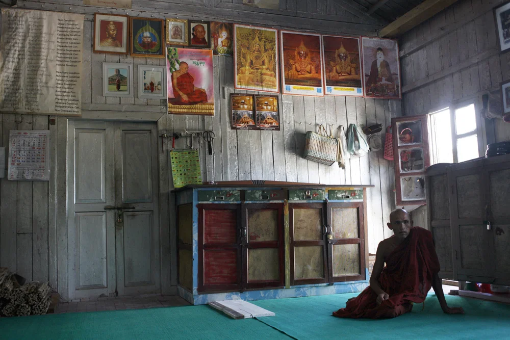  A monk observed while the master monk spoke to students at a monastery in Inle Lake, Myanmar. 