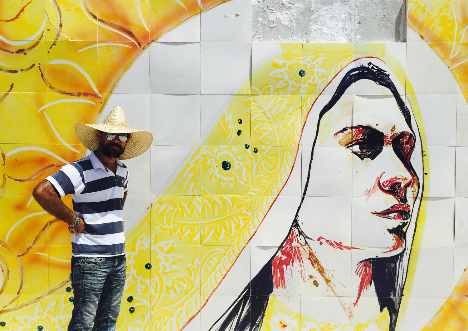  An artist with the university donates his time overseeing an installation near the port of Santiago de Cuba. 