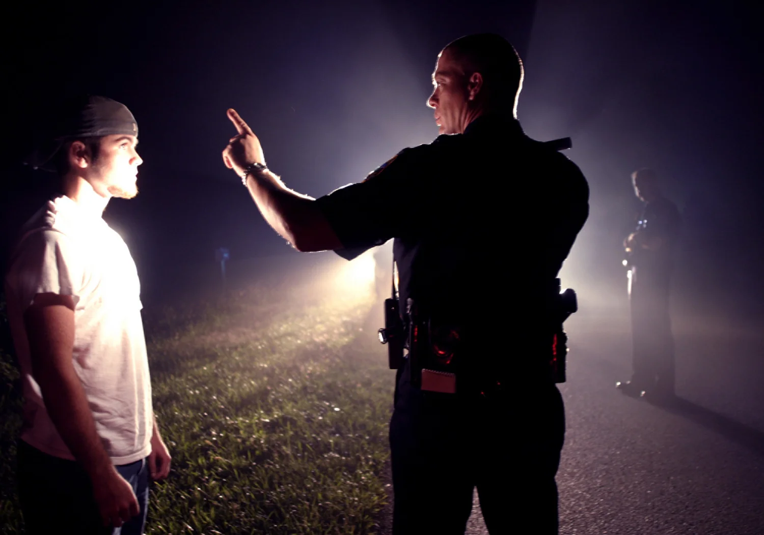 Will Armstrong, 17, passes a sobriety test, given by Officer Ernie Steff, as Ryan Petty stands guard. It was Armstrong’s first time being pulled over.