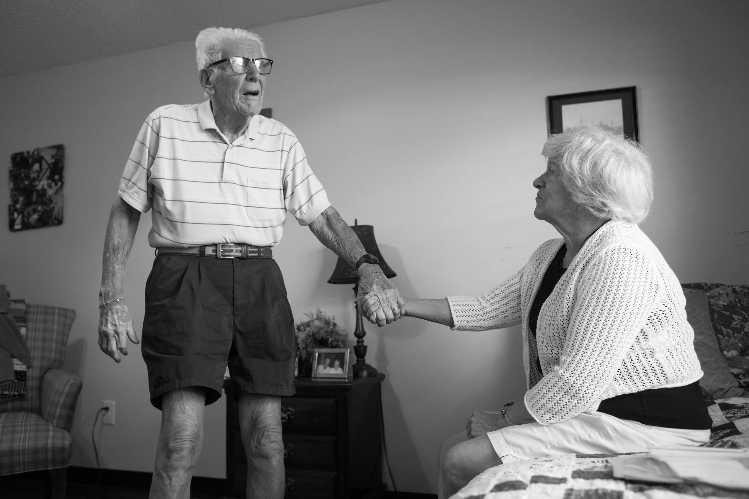 Jerry Rush, 90, clasps his wife's hand as he tries to make sense of his dementia at a nursing home in Lecanto. "I don't know where I am anymore," Rush said. "I guess I'm gonna die soon."