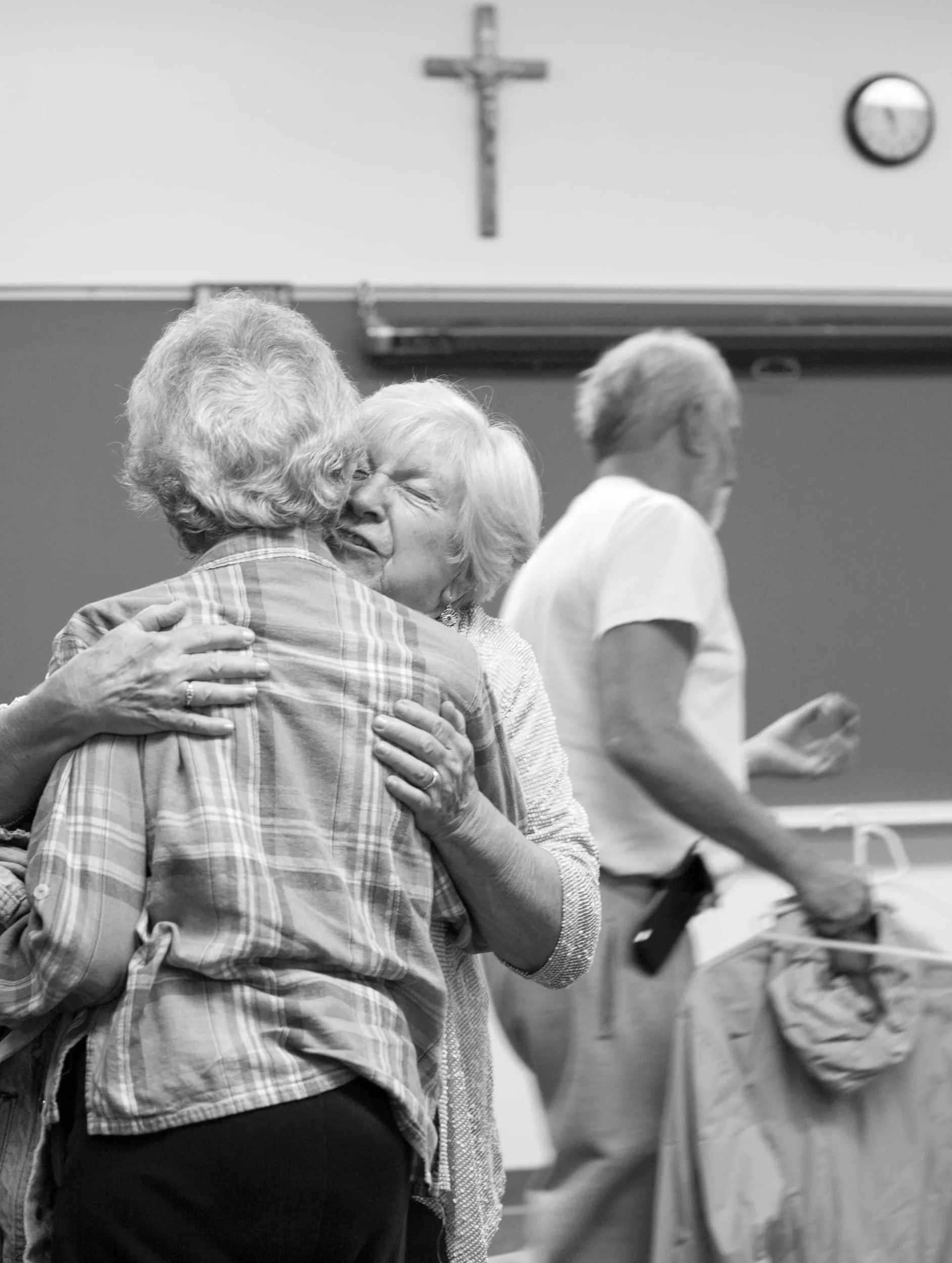 Joye Rush gives her friend a hug at an Alzheimer's support group. "The reason I go to the meetings is to help, because they were such a help to me...It’s okay to ask for help," she said.