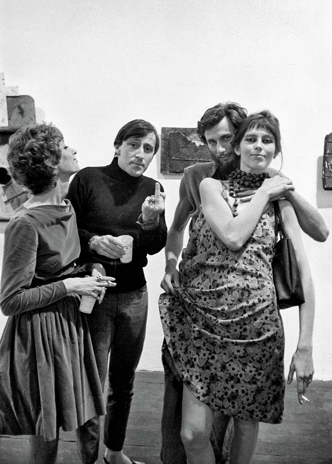  WALLACE BERMAN GEORGE HERMS   Shirley, Wallace, George, and Louise at the opening of George Herms exhibition, Aura Gallery, 1963.  