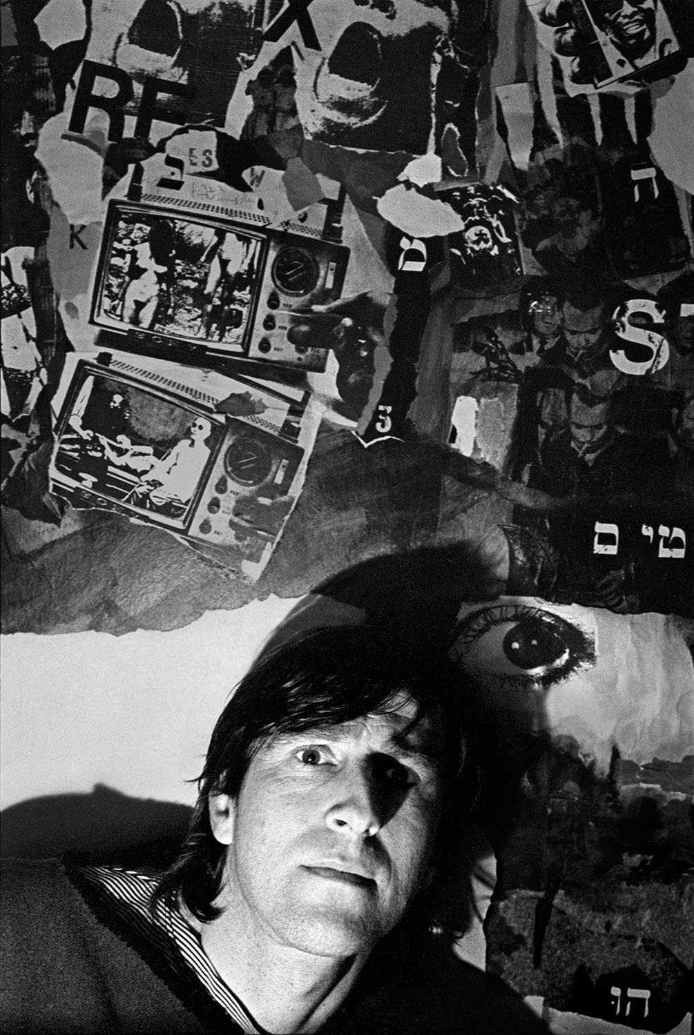  WALLACE BERMAN   Wallace in front of his collage  “ Papa’s Got a Brand New Bag”, Beverly Glen studio, Los Angeles, California. 1965  