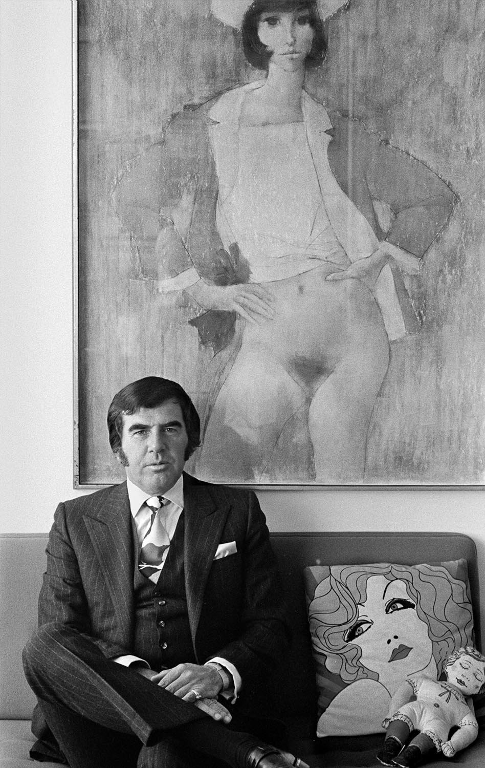  ROBERT MILES RUNYAN      American graphic designer, at his studio, Playa Del Rey, California, 1977. Semi-nude drawing by John Altoon.      
