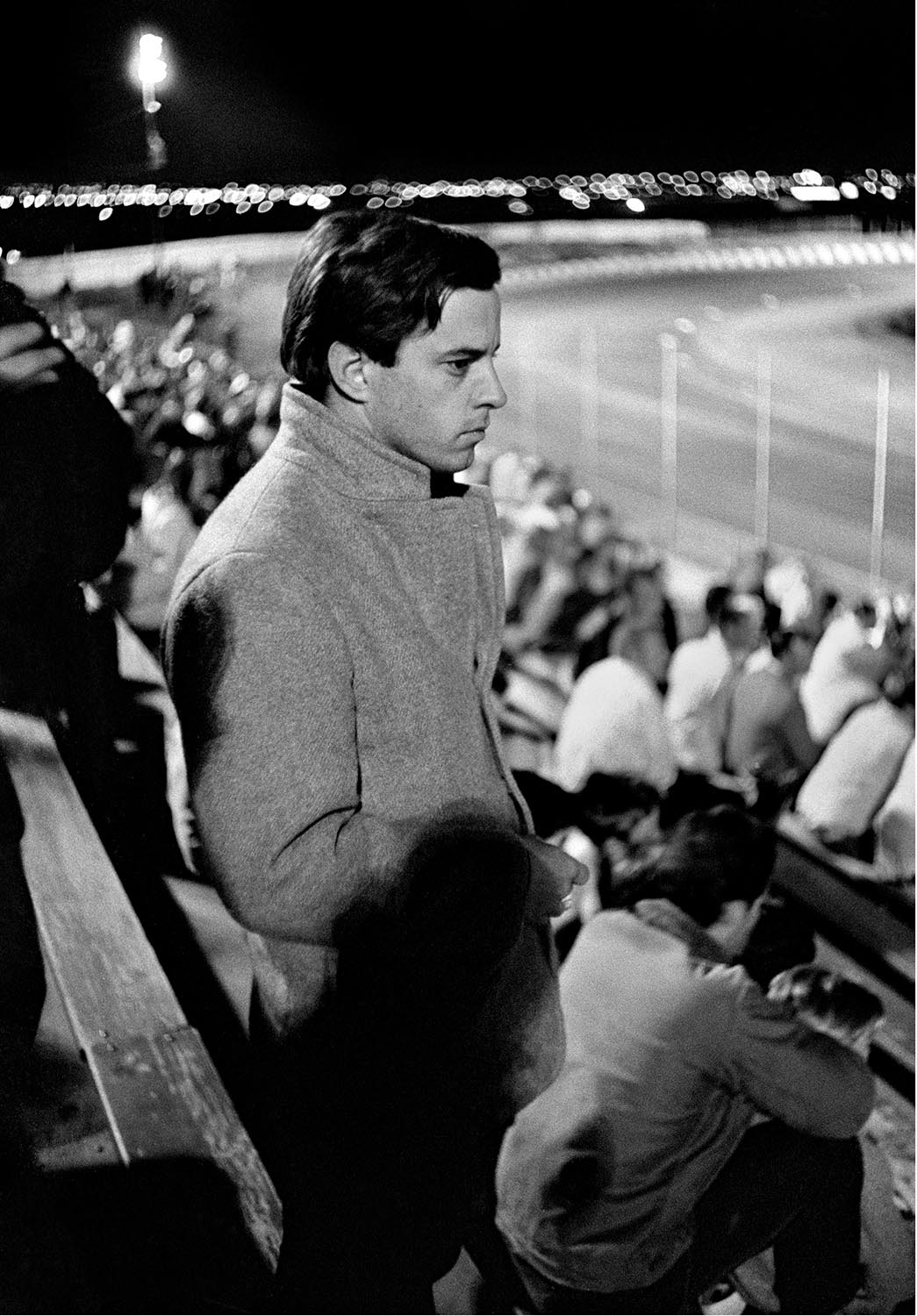  KEN PRICE   Watching Bengston race, Ascot Park Raceway, Gardena, California, 1963  