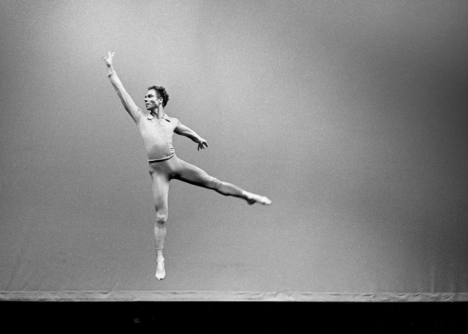  MERCE CUNNINGHAM   Airborne, in a performance of “Suite for Five”  at UCLA, 1963  