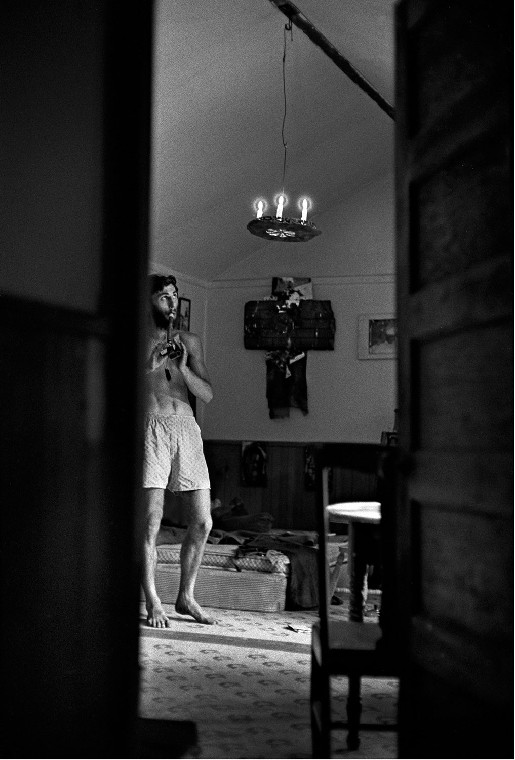  GEORGE HERMS   Playing the flute at his studio, Topanga Canyon, California, 1963  