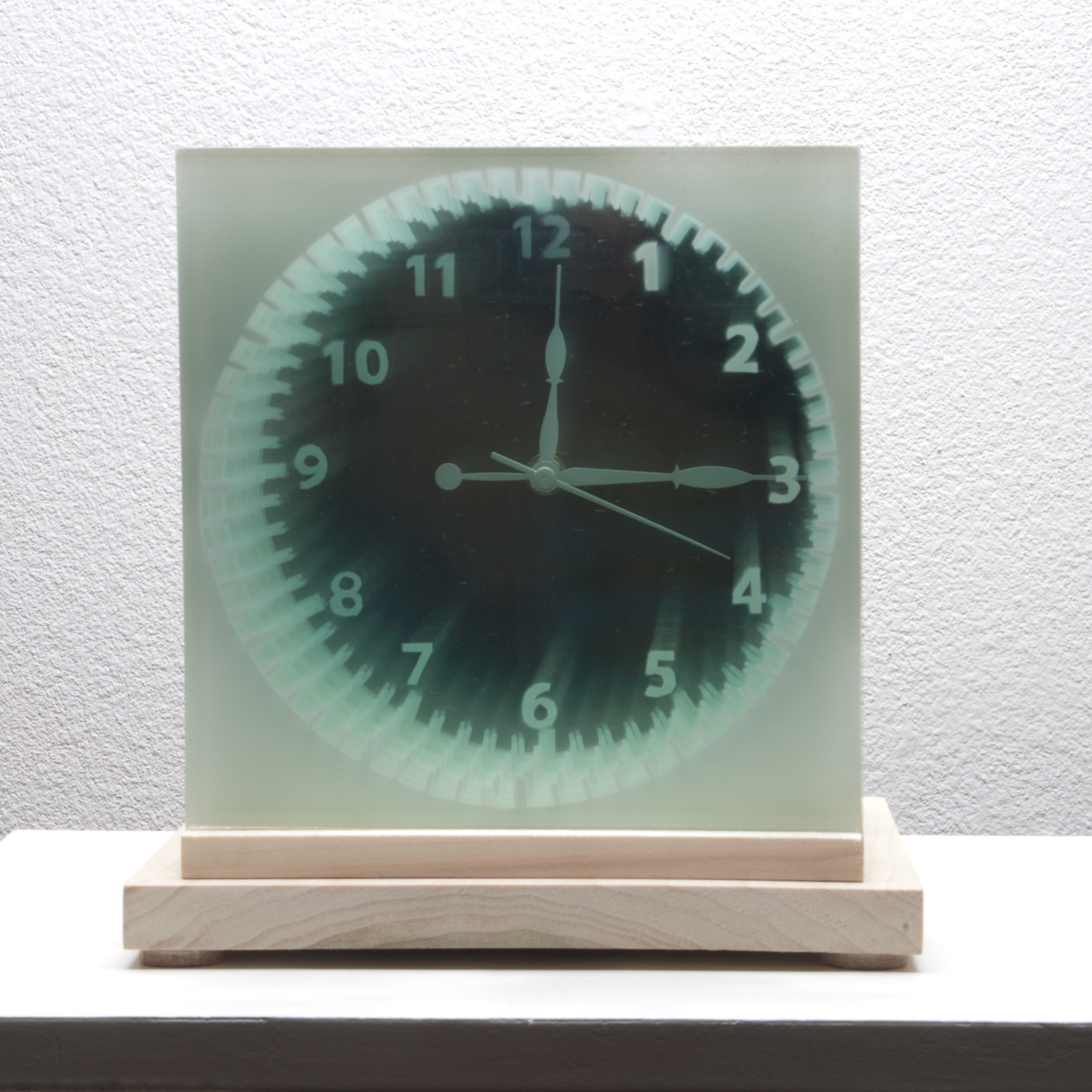 Space and Time Clock (front view) 2015 spray paint on 12 panes of glass with a metal clock and wood base 9 x 9 x 9 inches