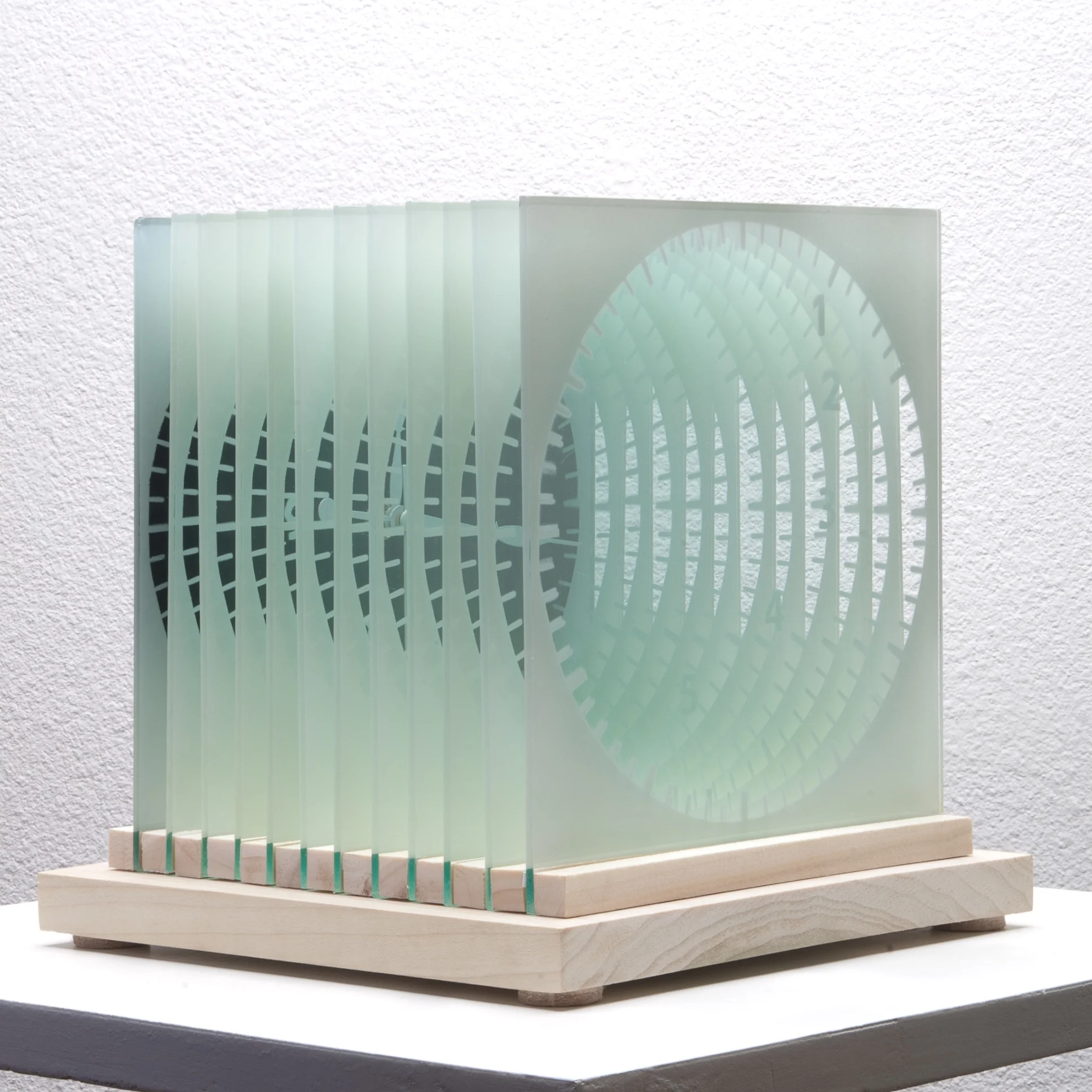 Space and Time Clock (three-quarter view) 2015 spray paint on 12 panes of glass with a metal clock and wood base 9 x 9 x 9 inches