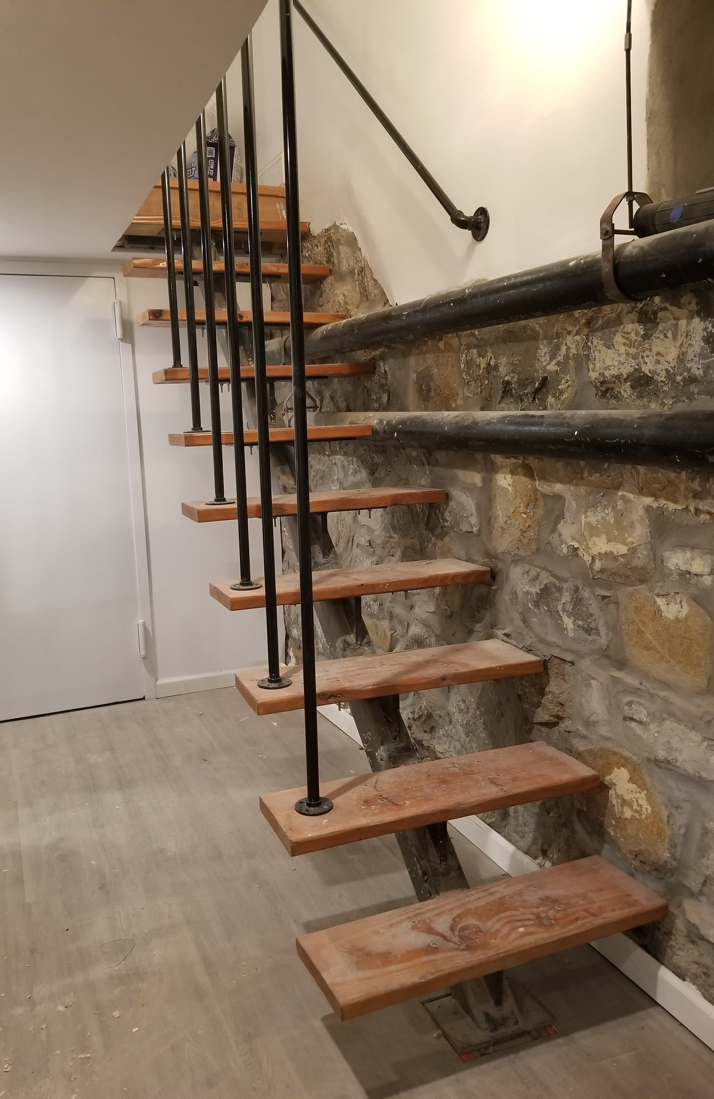 Stairs to main level from rec room.jpg