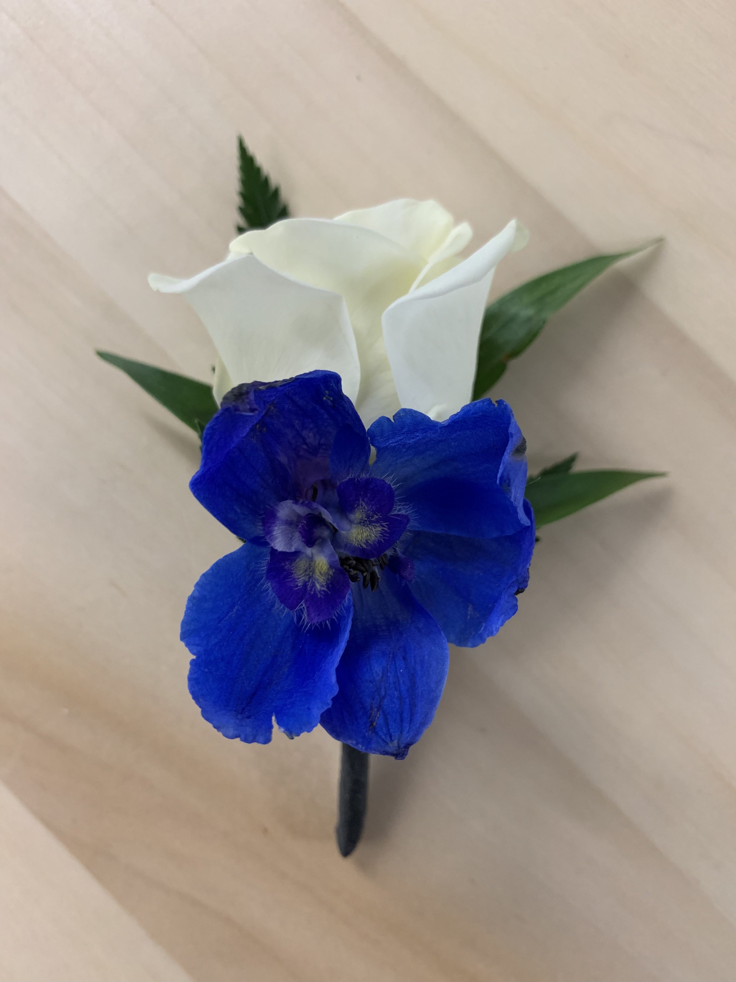 White Rose with Blue Delphinium Boutonniere