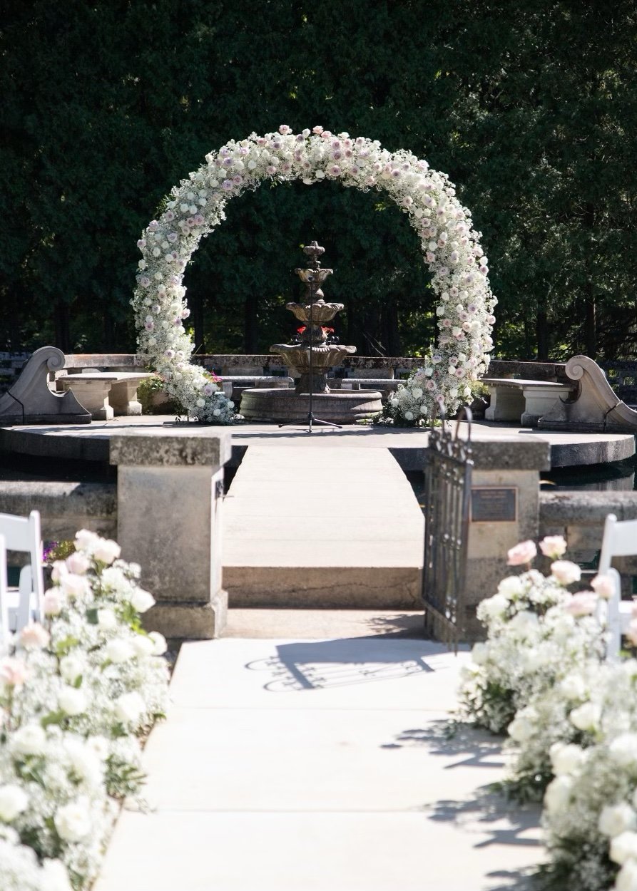 Baby's breath wedding arch by WS Floral.jpeg
