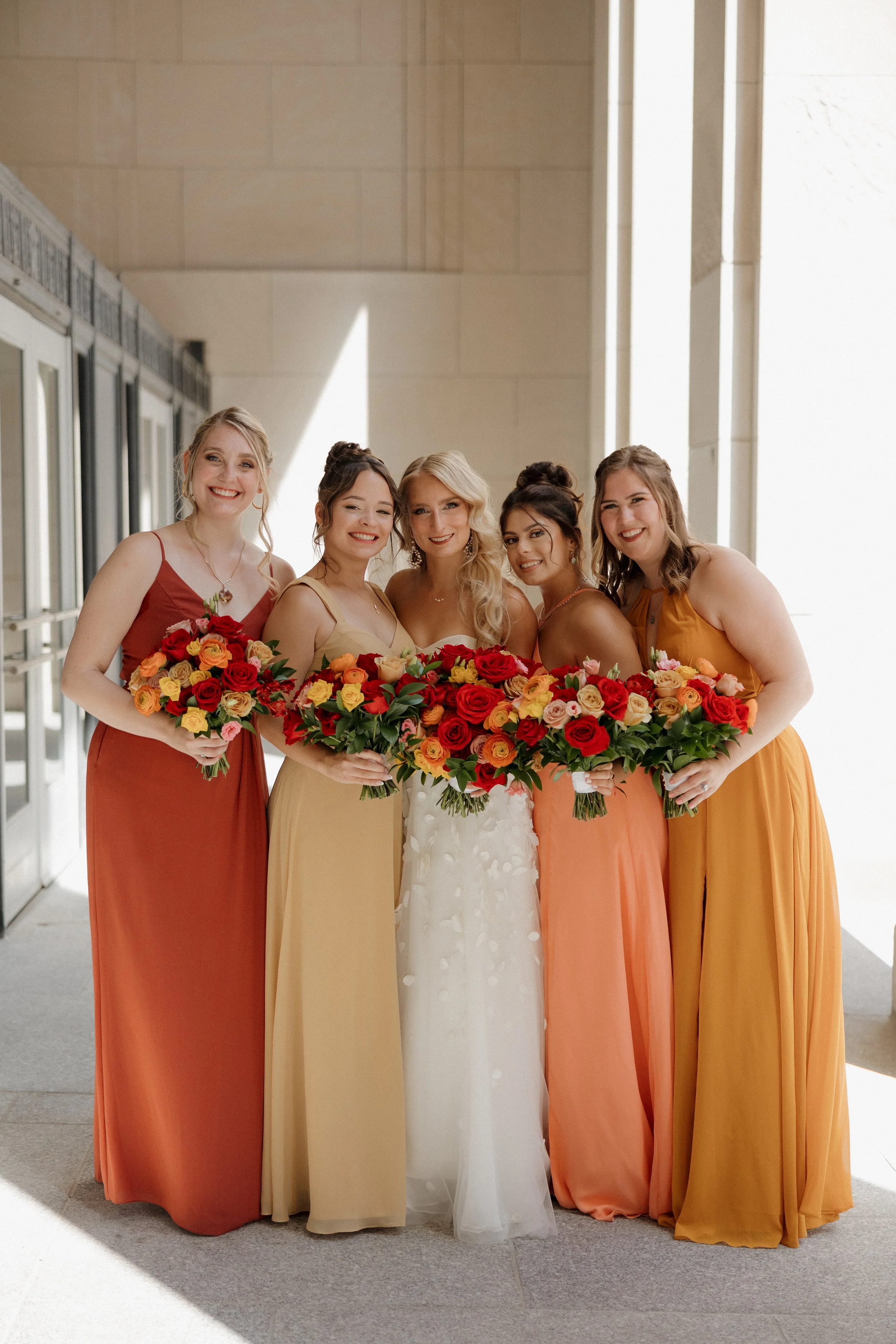 Warm tone bridal and bridesmaids bouquets by WS Floral.JPG