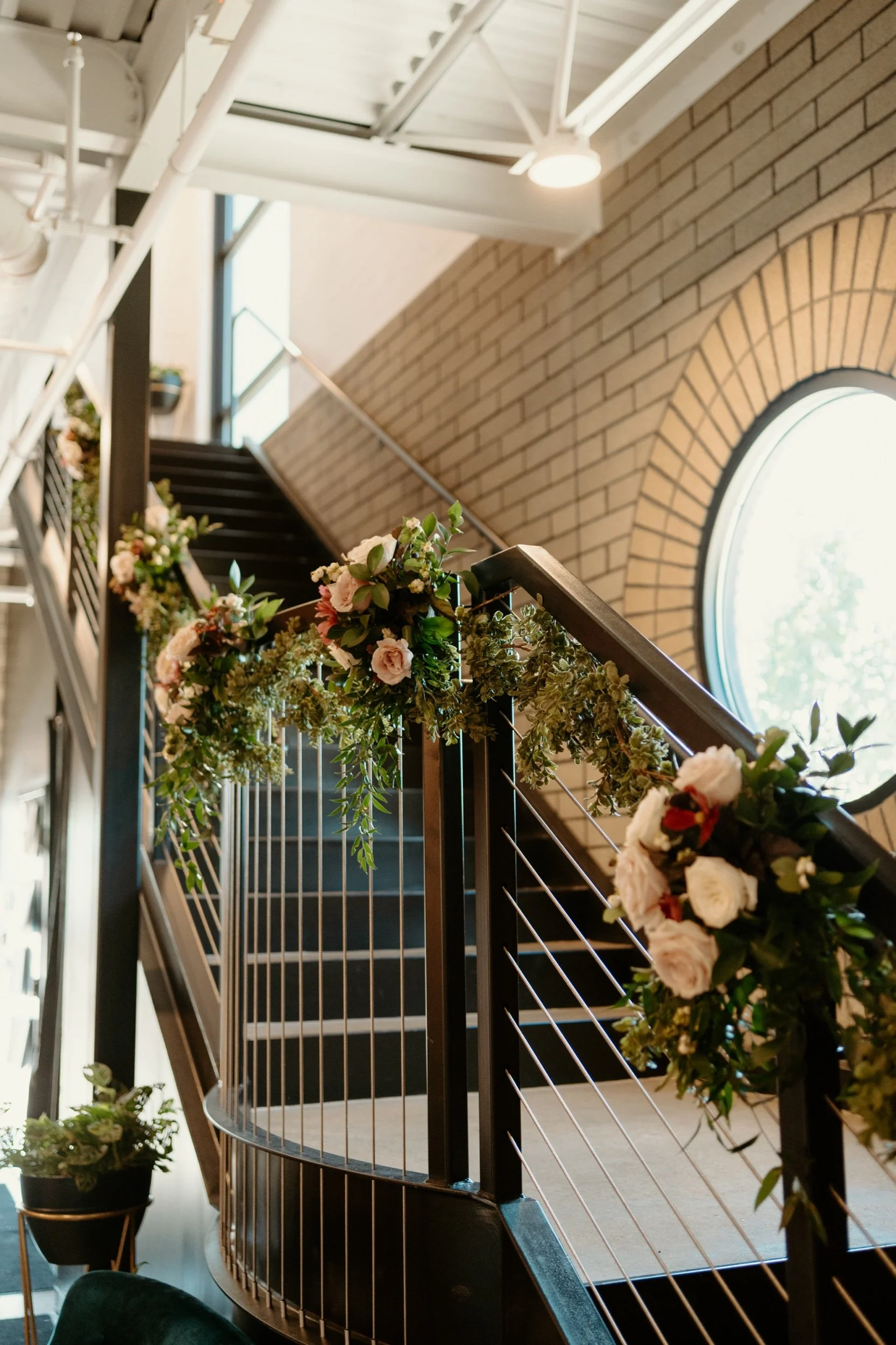 Pink, white, and burgundy staircase arrangements by WS Floral.jpeg