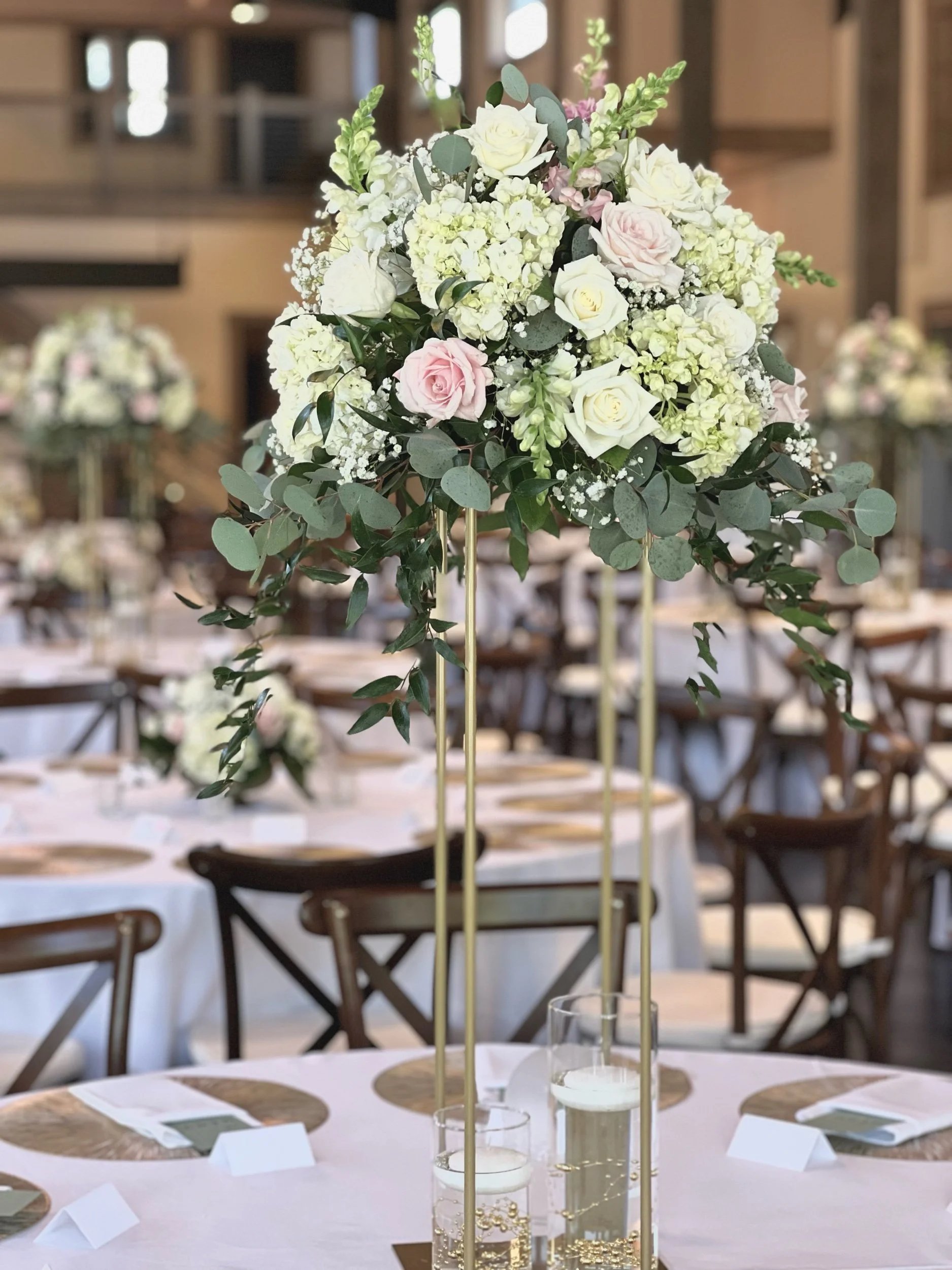 White and pink elevated centerpiece by WS Floral.jpeg