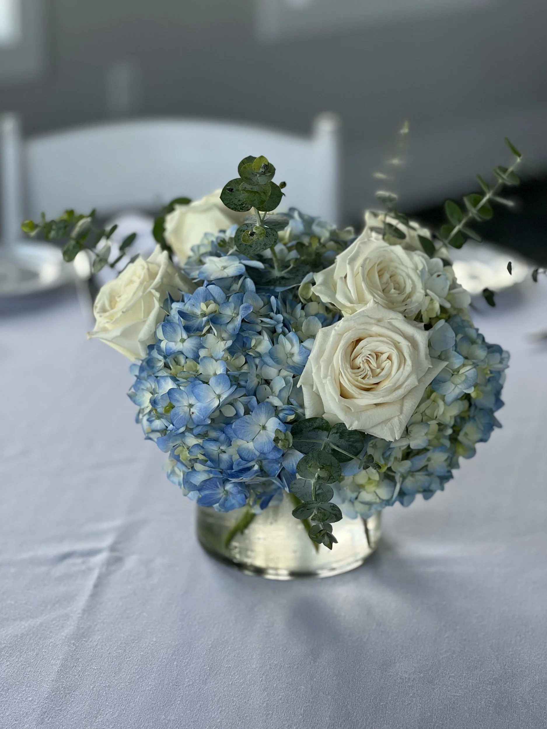 Blue and white centerpieces by WS Floral.jpeg
